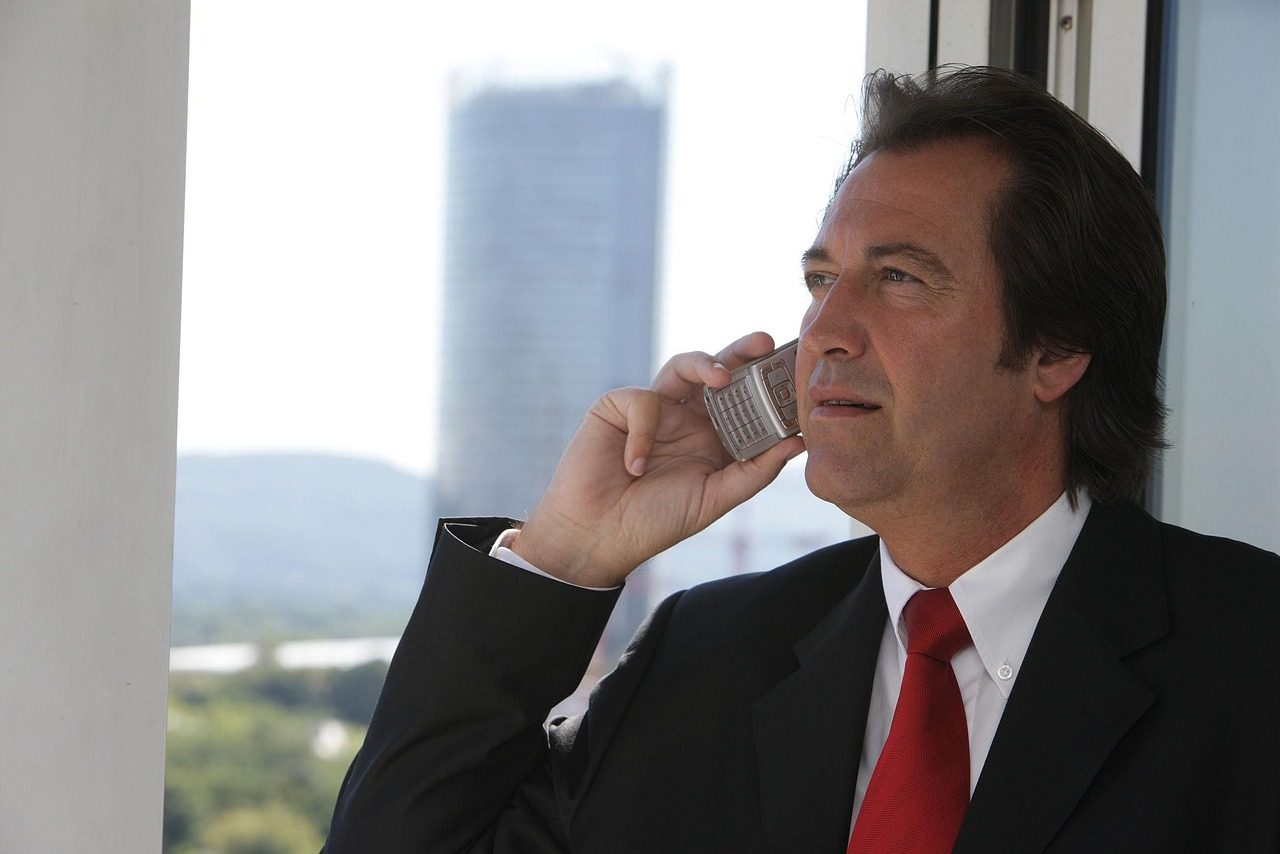 A business owner taking a phone call